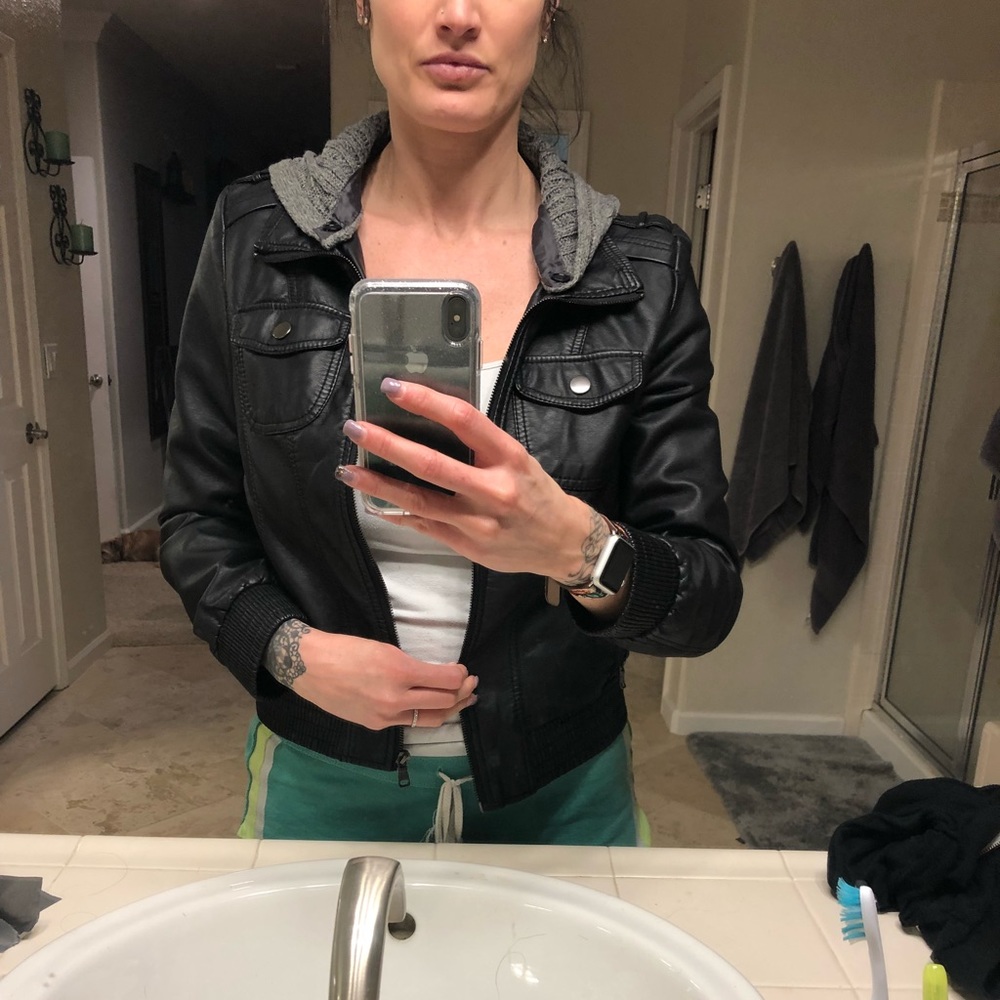 Black pleather jacket with hood.